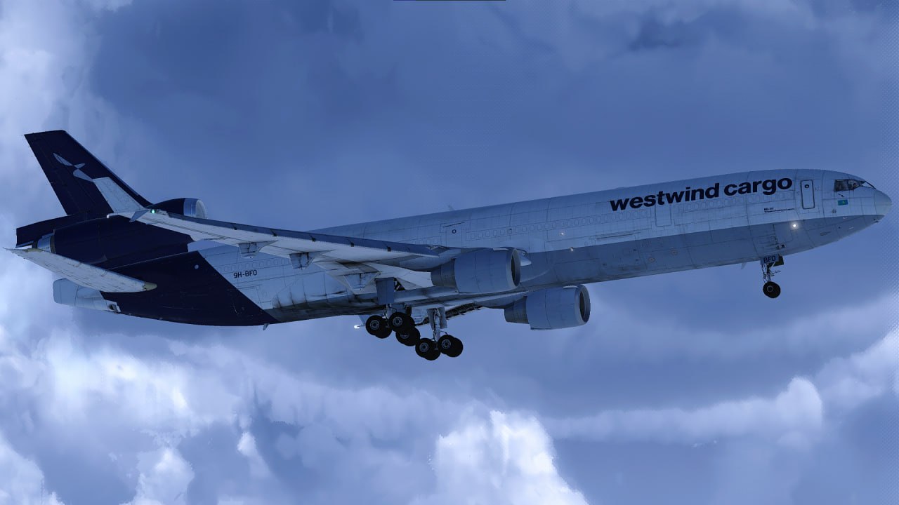 MD-11 cargo plane taking off at night
